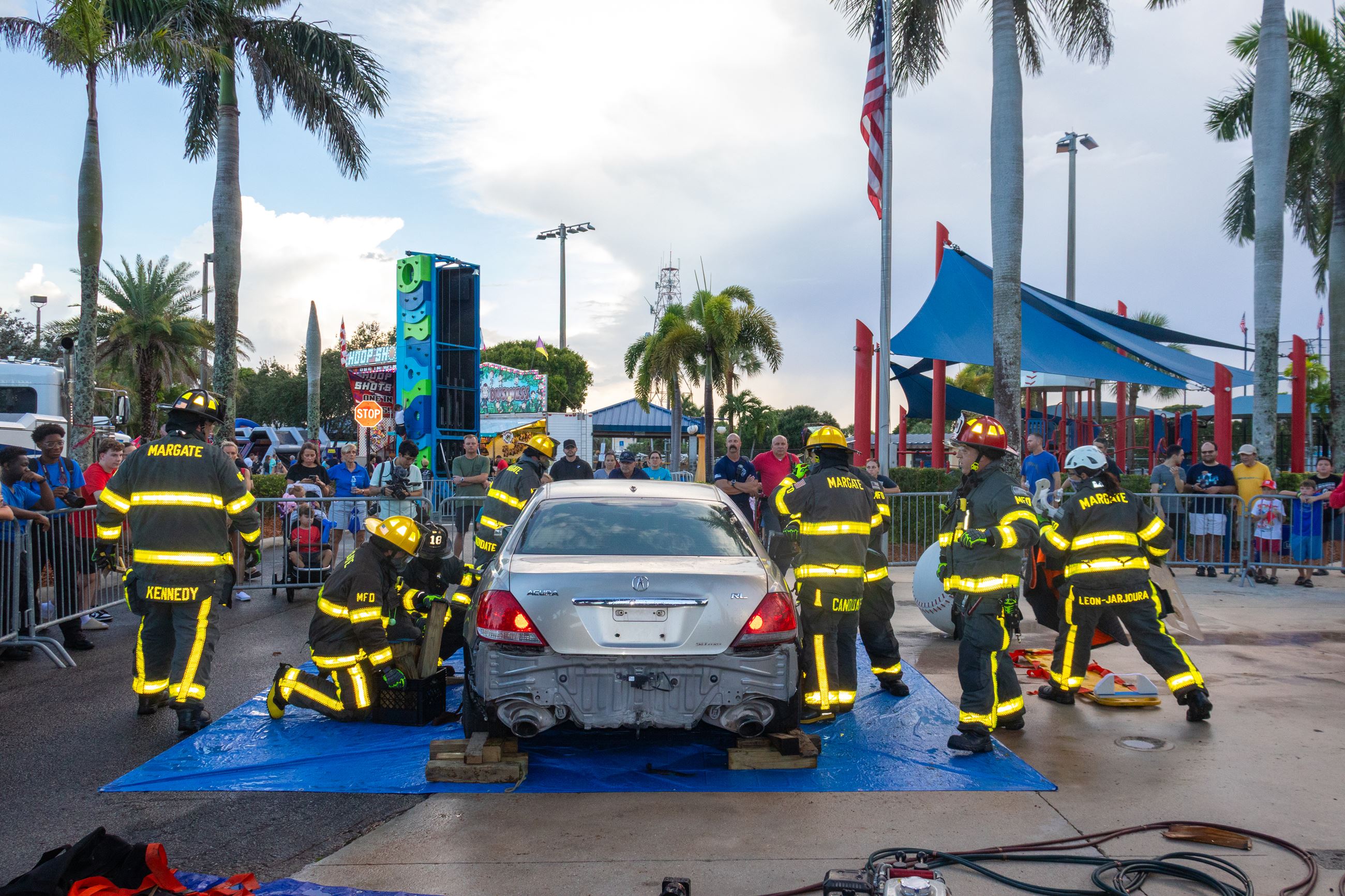 Margate Fire Department performs a vehicle extraction demonstration with residents looking on